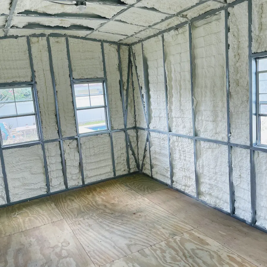 Closed-cell spray foam insulation applied to wall cavities in a residential project in Key Biscayne